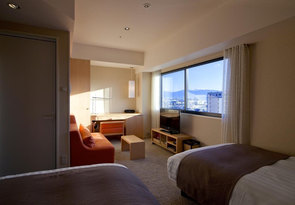 Cocochee Hotel נומאזו חדר תמונה