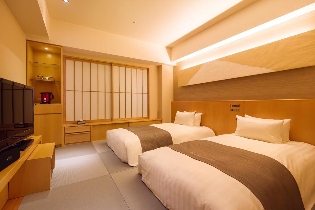 Cocochee Hotel נומאזו חדר תמונה